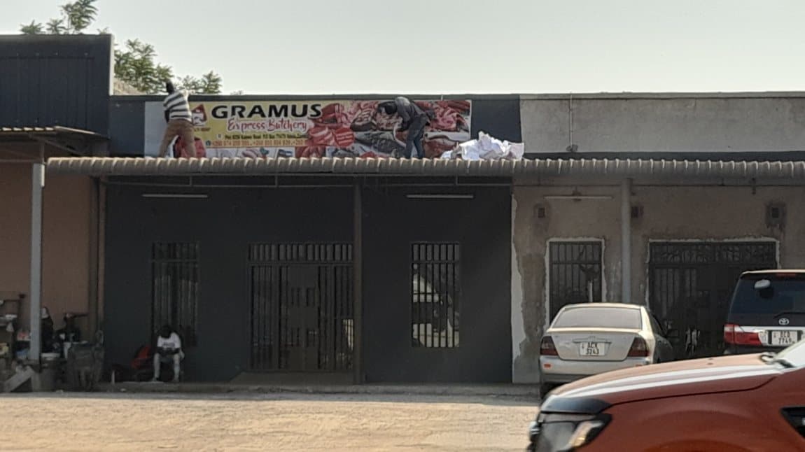 Branded butchery shopfront with signage above the entrance