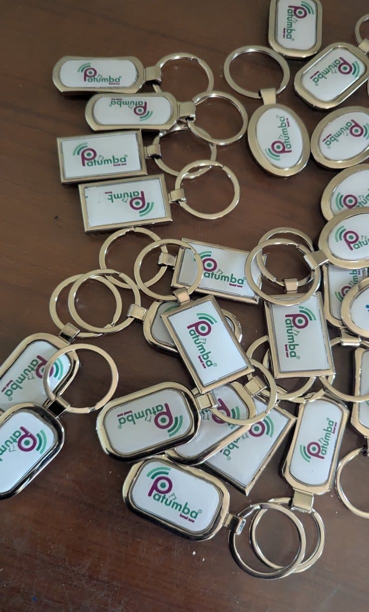 Batch of branded metal keyrings after production