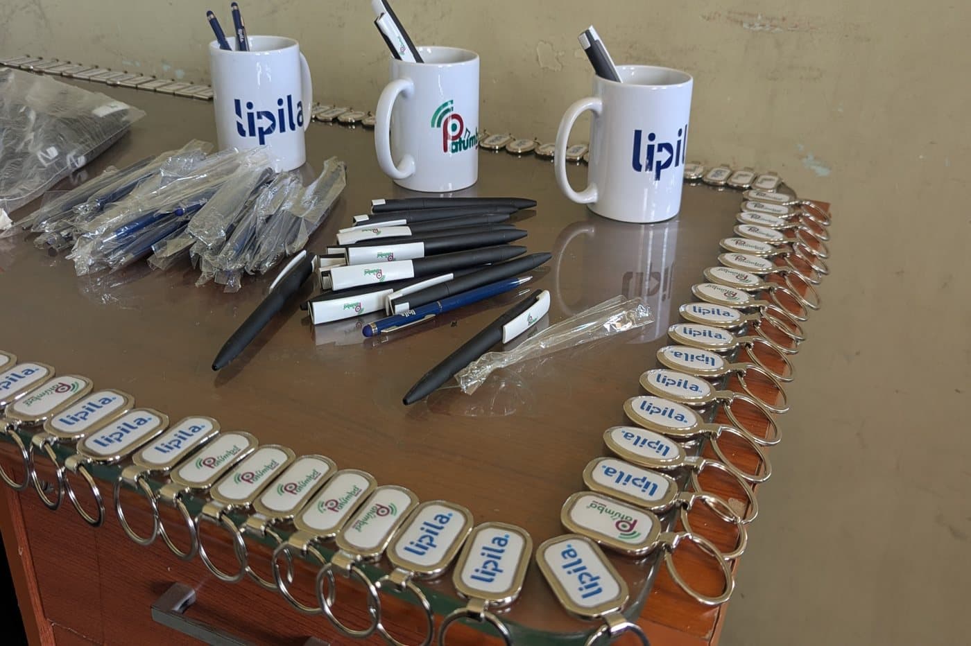 Branded mugs, pens and keyrings for Lipila and Patumba